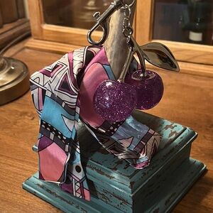 Geometric Patterned Scarf with Purple Glitter Cherries Keychain.